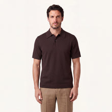 Model wearing rizvol alba cotton silk polo shirt in auburn