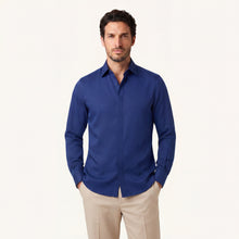 Model wearing Rizvol Cotton silk shirt in riva blue 