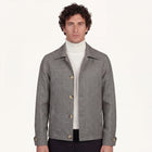 Model wearing Rizvol Grey jacket in wool silk linen