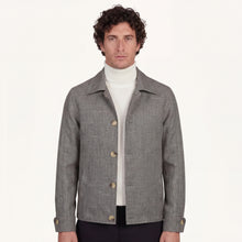 Model wearing Rizvol Grey jacket in wool silk linen