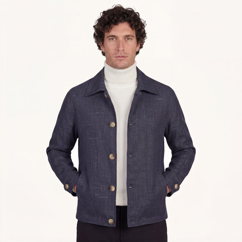 Model wearing Rizvol Aria wool silk linen jacket in navy blue