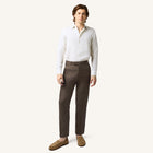 Model wearing Rizvol Dried Fig brown Italian linen trousers, full view