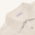 Rizvol Ivory Ash Beige linen polo shirt, close-up