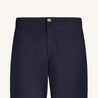 Navy blue pants with a button on a light gray background