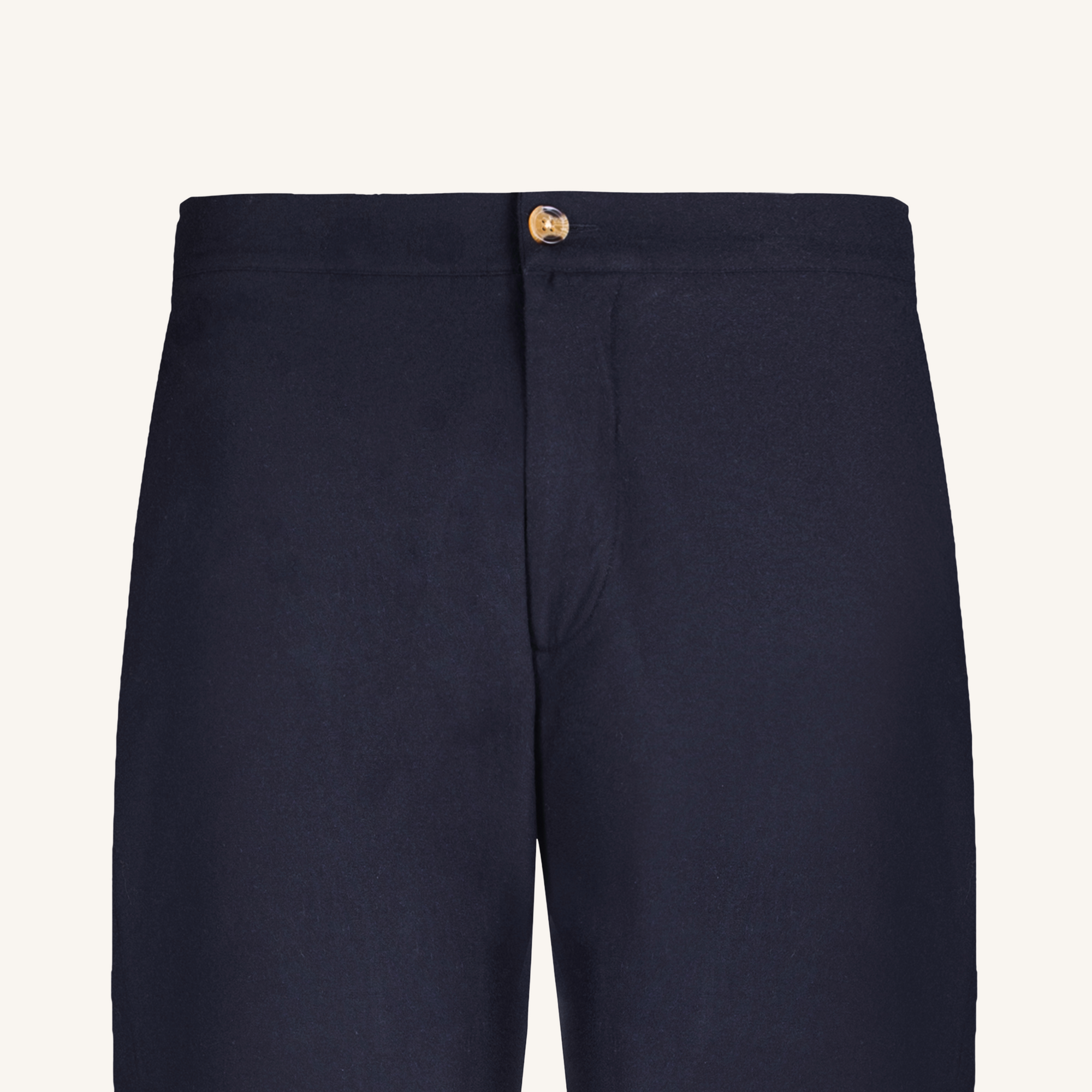 Navy blue pants with a button on a light gray background