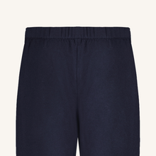 Navy blue pants on a white background