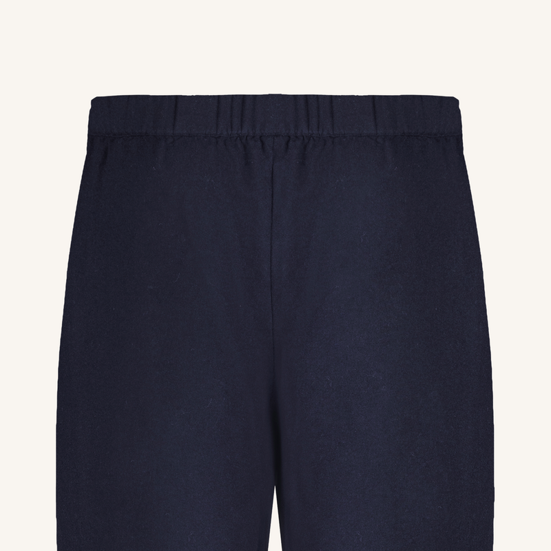 Navy blue pants on a white background